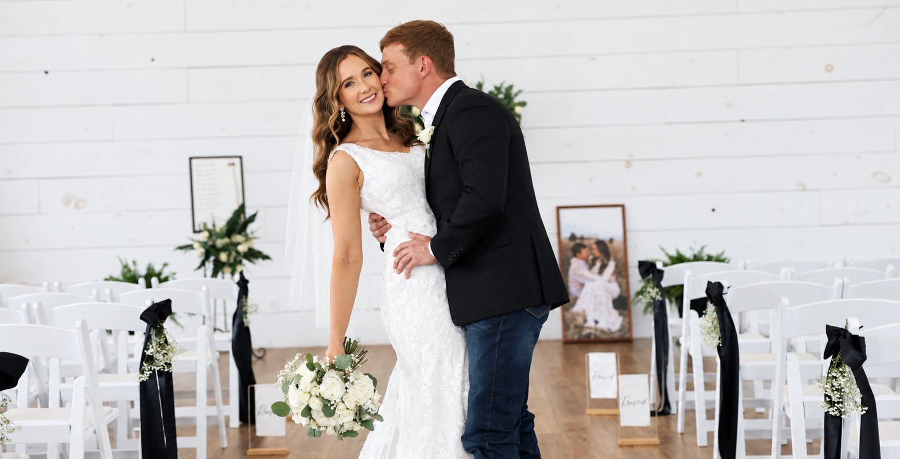 Bailee and Caleb together inside a bright white chapel
